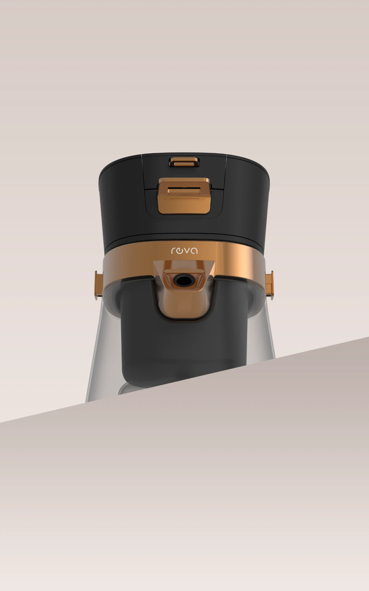 The reva device, black with a gold trim band, photographed close